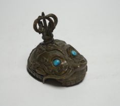 A 20th century Tibetan kapala cover, 9cm