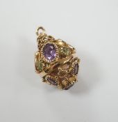 A modern 9ct gold, amethyst and peridot set pendant, or pierced spherical form, 25mm, gross weight
