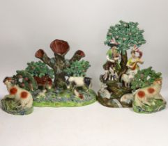 Four 19th century Staffordshire figurative groups; two musicians with sheep, etc. cows with calves