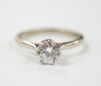 An 18ct and solitaire diamond set ring, size M, gross weight 1.9 grams, the stone diameter 5.5mm.