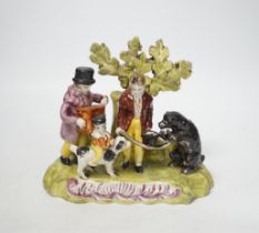 A Staffordshire pearlware group of a performing animal troupe with a dancing bear, c.1820-30, 15cm