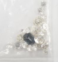 Twenty one unmounted cut diamonds, the four largest stones with an approximate total weight of 2.