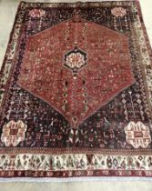 An Abadeh brick red ground carpet, 210 x 155cm