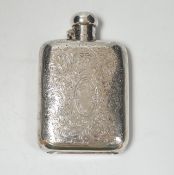 An Edwardian engraved silver hip flask, G & JW Hawksley, Sheffield, 1901, 13.7cm.