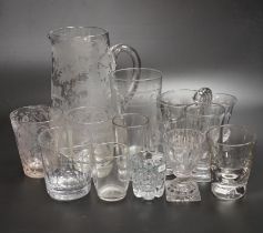 Fourteen 19th century glass items, including a jug heavily engraved with a scene of a stag in a