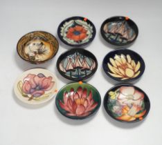 Seven Moorcroft floral dishes, two with Kerry Goodwin stamp to the base and a dormouse bowl designed
