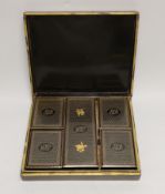A mid 19th century Chinese export gaming set with mother of pearl counters, contained in a mid