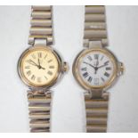 Two lady's steel and gold plated Dunhill quartz wrist watches, one with Dunhill box.