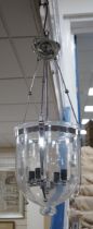A pair of chrome plated and glass hanging lanterns