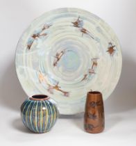 A Poole pottery lustre charger, initialled ‘MS’, 40cm and two vases with abstract designs, largest