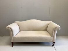 An Edwardian scroll arm settee, recently re-upholstered in a natural colour fabric, width 170cm,