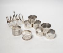 A set of six silver napkin rings, Robert Pringle & Sons, London, 1953, two other silver napkin rings
