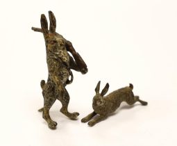 A novelty Austrian cold painted bronze model of a Hare with a rifle slung over its shoulder, 6.