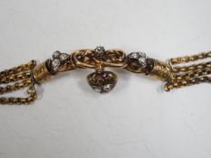 An antique yellow metal (test as 18ct) and rose cut diamond set triple strand bracelet, the