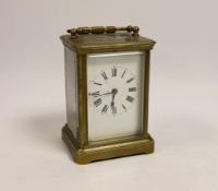 A brass carriage timepiece with travelling case, 11cm