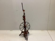 A 19th century lead and brass mounted turned mahogany spinning wheel, height 118cm