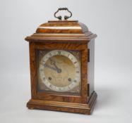 An Elliott mantel clock, the dial inscribed Arthur Saunders, London, 31cm high