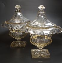 A pair of 19th century square base cut glass sweetmeat vases and covers, 29cm high