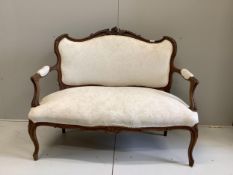 A late 19th century French walnut upholstered settee, width 126cm, depth 58cm, height 98cm