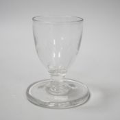 An English lead crystal ships’ dram, c1790-1800, the bowl, which is heavily striated, is of