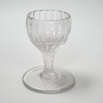 An English lead crystal dram, mid 18th century, with rib moulded bowl / stem, this rare drawn