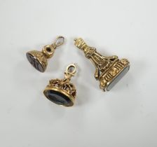 Three assorted Victorian and later yellow metal overlaid and chalcedony set fob deals, including