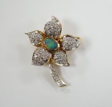 A modern 750 yellow metal, opal doublet? and diamond chip set flower brooch, 31mm, gross weight 7.