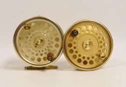 A House of Hardy Sovereign centre pin fly reel Serial Number 084 with spare spool reel in