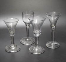 A group of four Georgian wine glasses, c.1740-50, tallest 16.8cm
