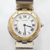 A steel and gold Cartier Ronde Vendom quartz wrist watch, with Roman dial, on a Cartier steel and
