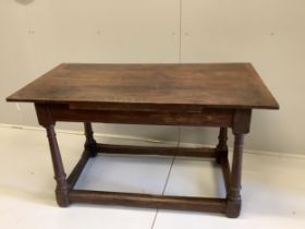 An 18th century style rectangular oak four plank table, width 128cm, depth 68cm, height 73cm