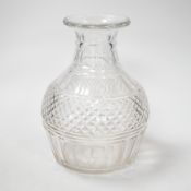 An English lead crystal Regency carafe, three rows of square cut facets alternate with two cut rings