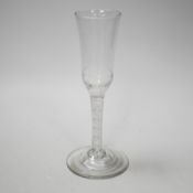 An English lead crystal ratafia glass, c.1750-60, the bowl is slightly waisted and elongated with an