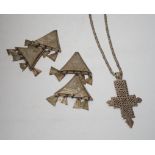 An Ethiopian white metal cross pendant necklace, overall 90cm, together with a pair of Tuareg