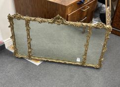 A giltwood and composition triple plate overmantel mirror, width 115cm, height 66cm