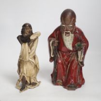 Two Chinese Shiwan pottery figures, largest 27cm high