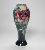 A Moorcroft ‘Rose & Bud’ vase by Sally Tuffin, limited edition 423/500, 27cm high