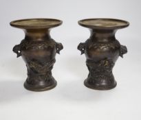 A pair of small Japanese bronze 'dragon' vases, 12.5cm