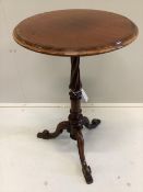 A Victorian circular banded mahogany tripod wine table, labelled T & G Seddon, diameter 46cm, height