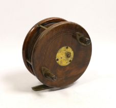 A David Slater patent five inch Starback centre pin fishing reel, brass mounted walnut with twin