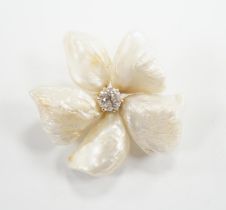 A yellow metal mounted baroque pearl and single stone diamond set flower head brooch, 30mm, gross