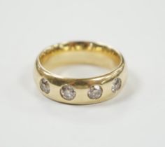 A 14k and four stone gypsy set diamond ring, size J/K, gross weight 7.4 grams.