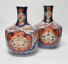 A pair of Japanese Imari vases, Meiji period, ink label to one base, 29cm high
