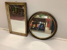 A circular lacquered bevelled wall mirror, diameter 50cm, together with a rectangular gilt framed