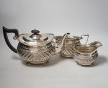 A George V demi fluted silver three piece tea set, Nathan & Hayes, Chester, 1913, gross weight 37.