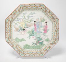 A Japanese porcelain octagonal dish enamelled with figures, dragon and bird, Meiji period, 36cm