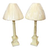 A pair of Italian alabaster table lamps with fluted columns and stepped square bases, now with brand