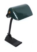 A 1930's German desk lamp by Dr Ing-Schnider & Co. with cast iron base, wrought iron stem and dark