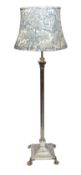 An early 20th century English silver plated brass telescopic lamp standard with corinthian column,