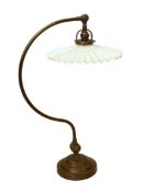 A 1930's French brass desk lamp with opaque white glass shade, height 59cm